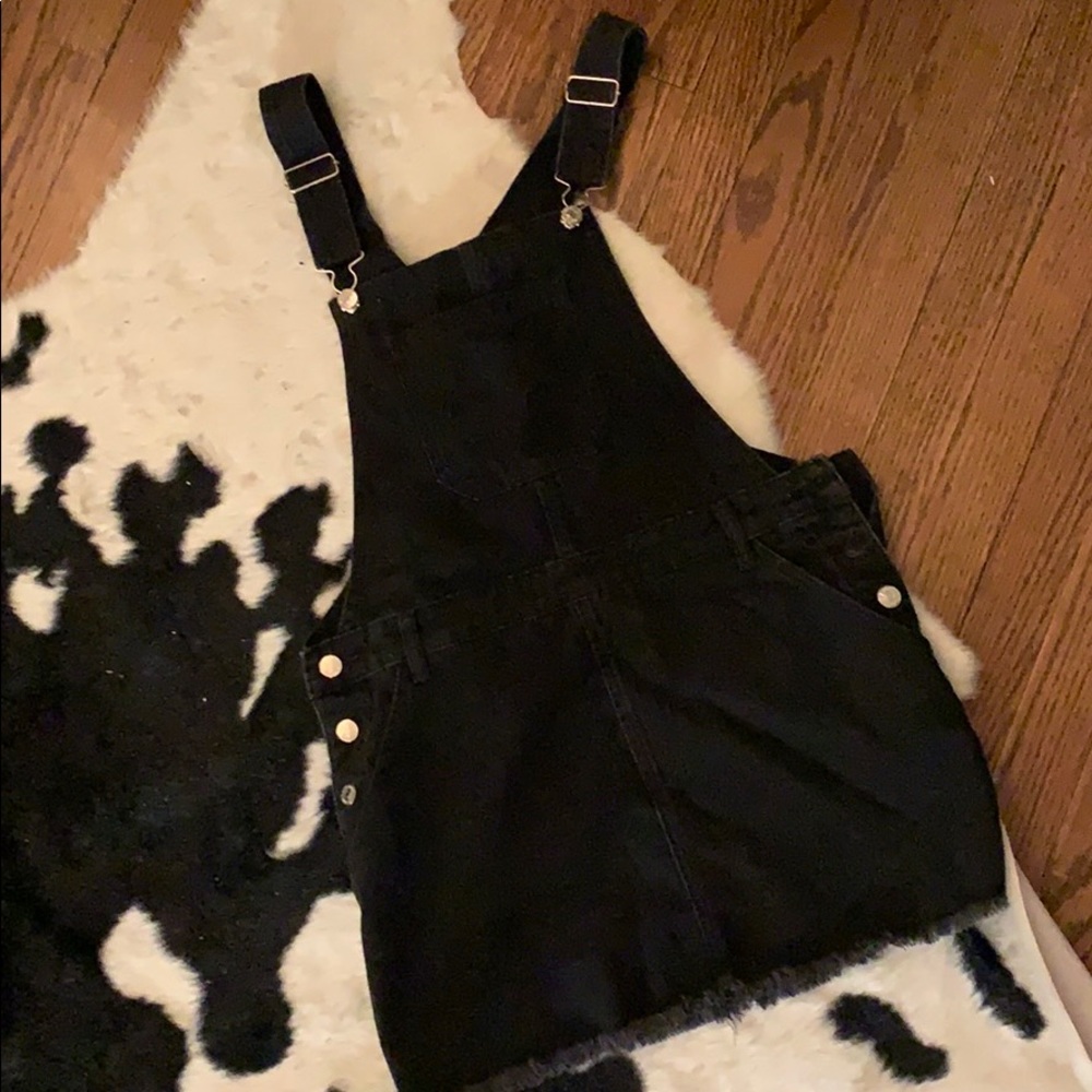 Black Jean overall jumper.